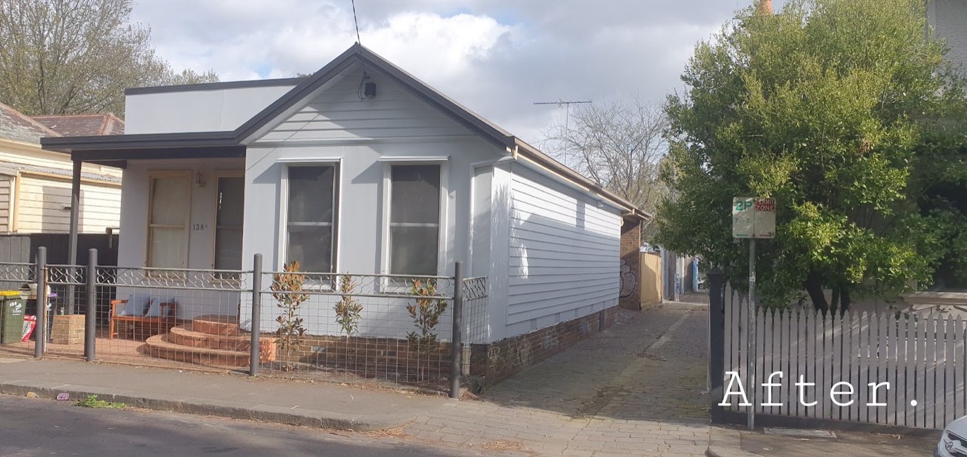 The side of the cottage after painting, clean and fresh