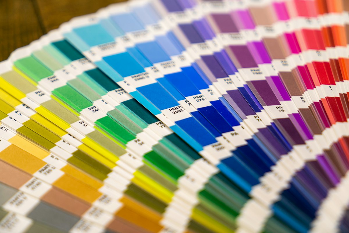 A fan deck of paint colour swatches
